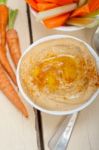 Fresh Hummus Dip With Raw Carrot And Celery Stock Photo