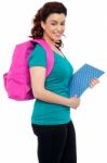 Student With Backpack And Notebook Stock Photo