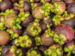 Closeup Fresh Mangosteen For Sale At Market Stock Photo