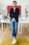 Handsome Young Businessman Looking At Camera In The Office Stock Photo