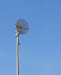 Satellite Dish On Pole Stock Photo