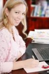 Beautiful Young Doctor At Her Office Stock Photo