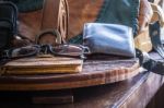 Leather And Accessories On A  Table Stock Photo