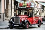 Old Fashioned Red Bus In Rothenburg Stock Photo