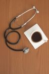 Stethoscope With Coffe Cup Stock Photo