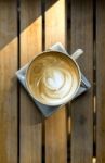 Coffee Latte With On Wooden Table Stock Photo