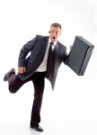 Businessman Running With Briefcase Stock Photo