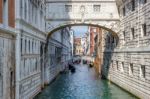 Gondoliers Ferrying People In Venice Stock Photo