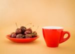 Beautiful Breakfast Of Red Coffee Cup And Cherries Stock Photo