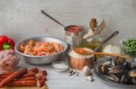 Ingredients For Paella On The White Scratched Table Horizontal Stock Photo