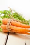 Baby Carrots Bunch Tied With Rope Stock Photo