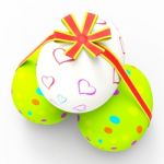 Easter Eggs Represents Gift Ribbon And Bow Stock Photo