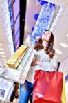 Beautiful Young Woman Holding Shopping Bags Stock Photo