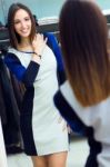 Beautiful Young Woman Shopping In A Clothes Shop Stock Photo