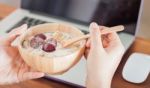 Granola With Fruits On Work Station Stock Photo