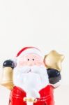 Santa Claus Holding Gold Star And Bell Stock Photo