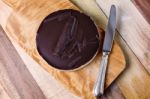 Fresh Classic Homemade Cheesecake With Dark Chocolate Topping Stock Photo