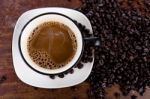 Coffee Cup And Beans Stock Photo