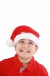 Little Boy In Santa Hat Stock Photo