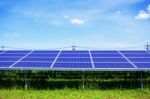 Solar Panels On Grass With Sky Stock Photo