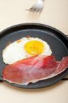 Egg Sunny Side Up With Italian Speck Ham Stock Photo