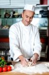 Chef Preparing Pizza Base Stock Photo