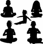 Silhouette Child Doing Meditation Stock Photo