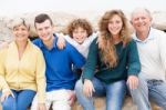 Family Having Fun On Beach Holiday Stock Photo