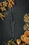 Dried Herbs And Ginseng, Top View Of Thai Herbs And Ginseng On Wooden Floor Stock Photo