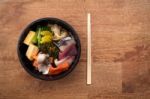 Japanese Food Tekka Don Take Away On Wooden Background Stock Photo