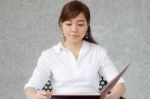 Portrait Of Thai Adult Businesswoman Beautiful Girl Read A Book Stock Photo