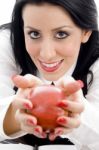 Female Holding An Apple Stock Photo