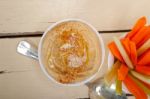 Fresh Hummus Dip With Raw Carrot And Celery Stock Photo