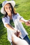 Young Couple Having Fun In A Park Stock Photo