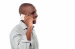 African Male Using Is Cell Phone Stock Photo