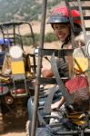 Young Woman Riding Atv Stock Photo