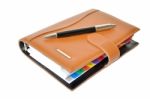 Daily Planner With Pen Stock Photo