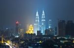 Kuala Lumpur, Malaysia At Night Petronas Bldg Twin Towers Stock Photo