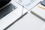 Business Desk With A Keyboard, Report Graph Chart, Pen And Table Stock Photo