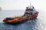 Supply Boat Transfer Cargo To Oil And Gas Industry Stock Photo