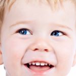 Toddler Blond And Blue Eyes Boy Child With Various Facial Expres Stock Photo