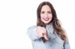 Happy Young Lady Pointing At You Stock Photo