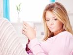 Woman At Home Holding Cup Of Tea Stock Photo