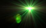 Abstract Green Light With Rays And Lens Flare Stock Photo