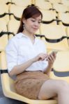 Portrait Of Thai Adult Businesswoman Beautiful Girl Using Her Smart Phone Stock Photo