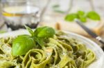 Homemade Spinach Pasta With Pesto And Parmesan Cheese Stock Photo