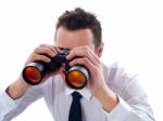 Male Looking Through Binoculars Stock Photo