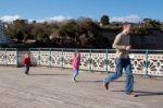 Cardiff Uk March 2014 - Family Playing On Penarth Pier Stock Photo