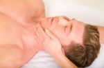 Man Receiving Face Massage Stock Photo