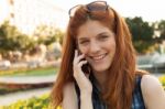 Woman Talking On The Phone Stock Photo